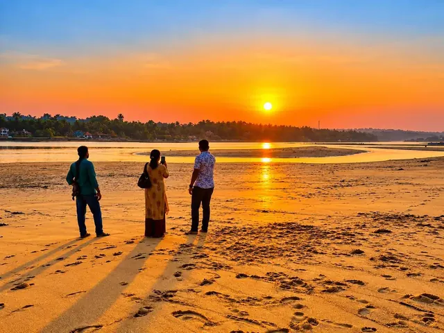 Sunset over the Poovar golden sand beach