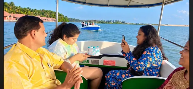 Family on a Poovar boat cruise on the estuary