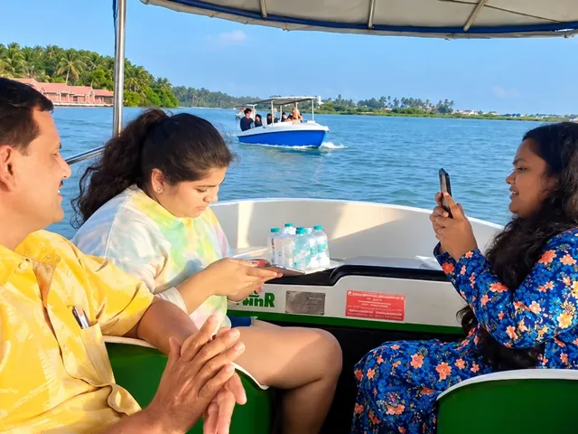 Family celebrating on a Poovar Boating Cruise boat on the backwaters – Birthday Celebration cruise