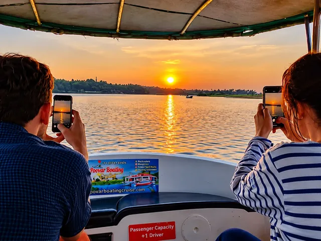 Guests photographing the sunrise over the Poovar backwaters from the boat – Poovar Boating Sunrise Cruise
