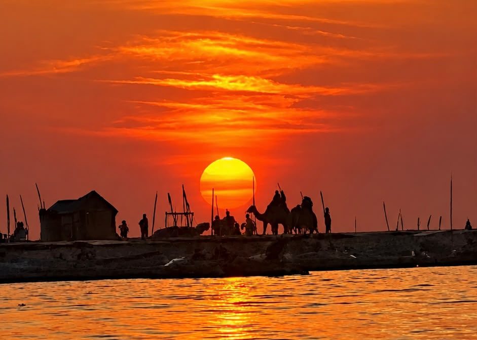 Sunset at the Poovar golden sand beach